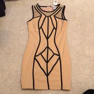 Stretchy material, great pattern, comfy dress. New size M